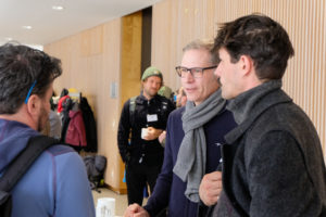 SmartForest 2026 participants chat in the foyer during the conference.