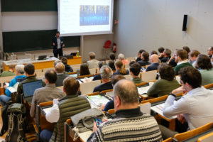 The crowd listens attentively during Thorsten Reitz' presentation at SmartForest 2026