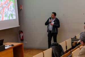 Large projected Powerpoints being used by the speakers at SmartForest 2026