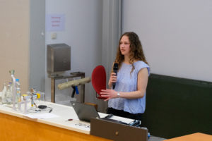 A presenter addresses the crowd in the auditorium during SmartForest 2026