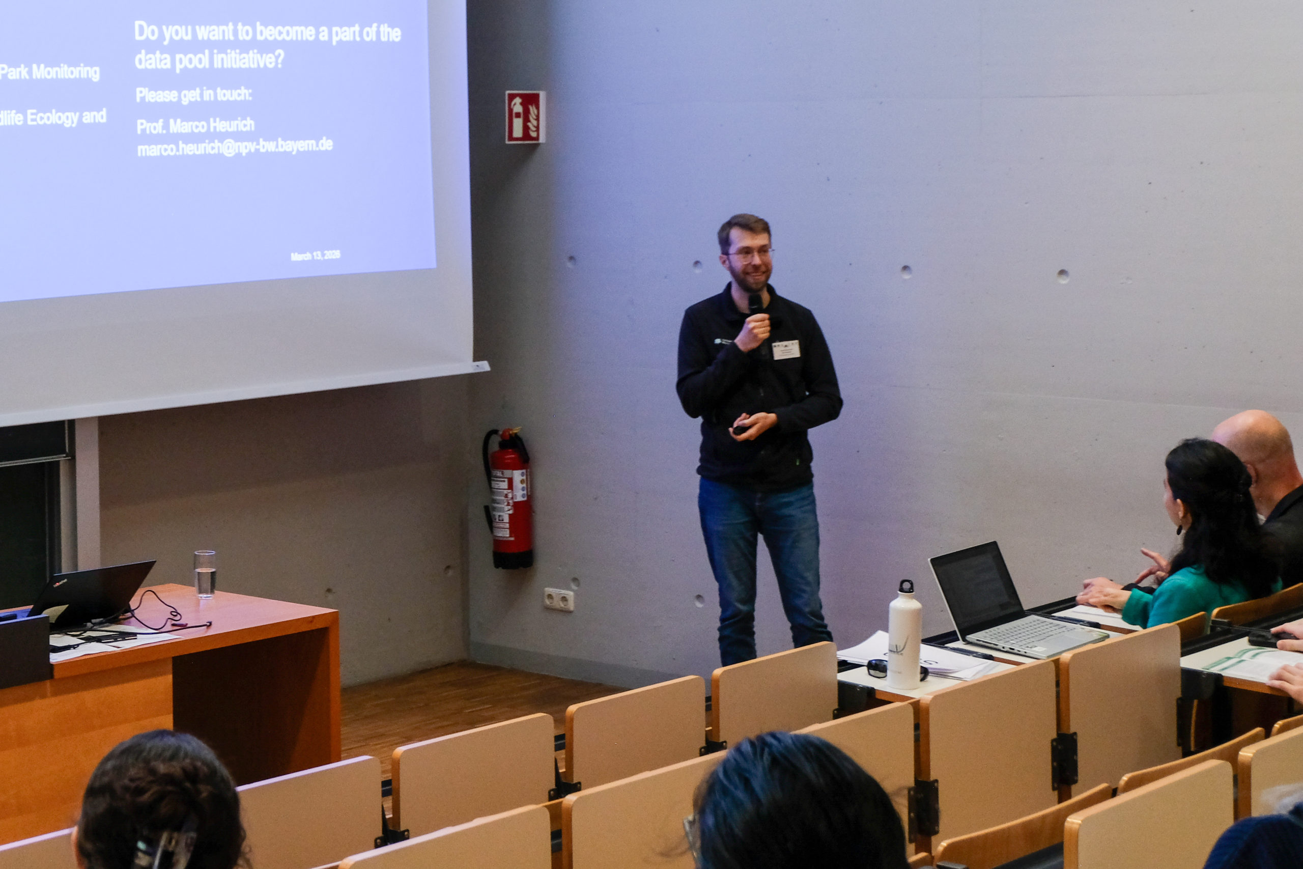 A speaker at SmartForest 2026 shows contact information on a slide. u0022Do you want to become a part of the data pool initiative? Please get in touchu0022